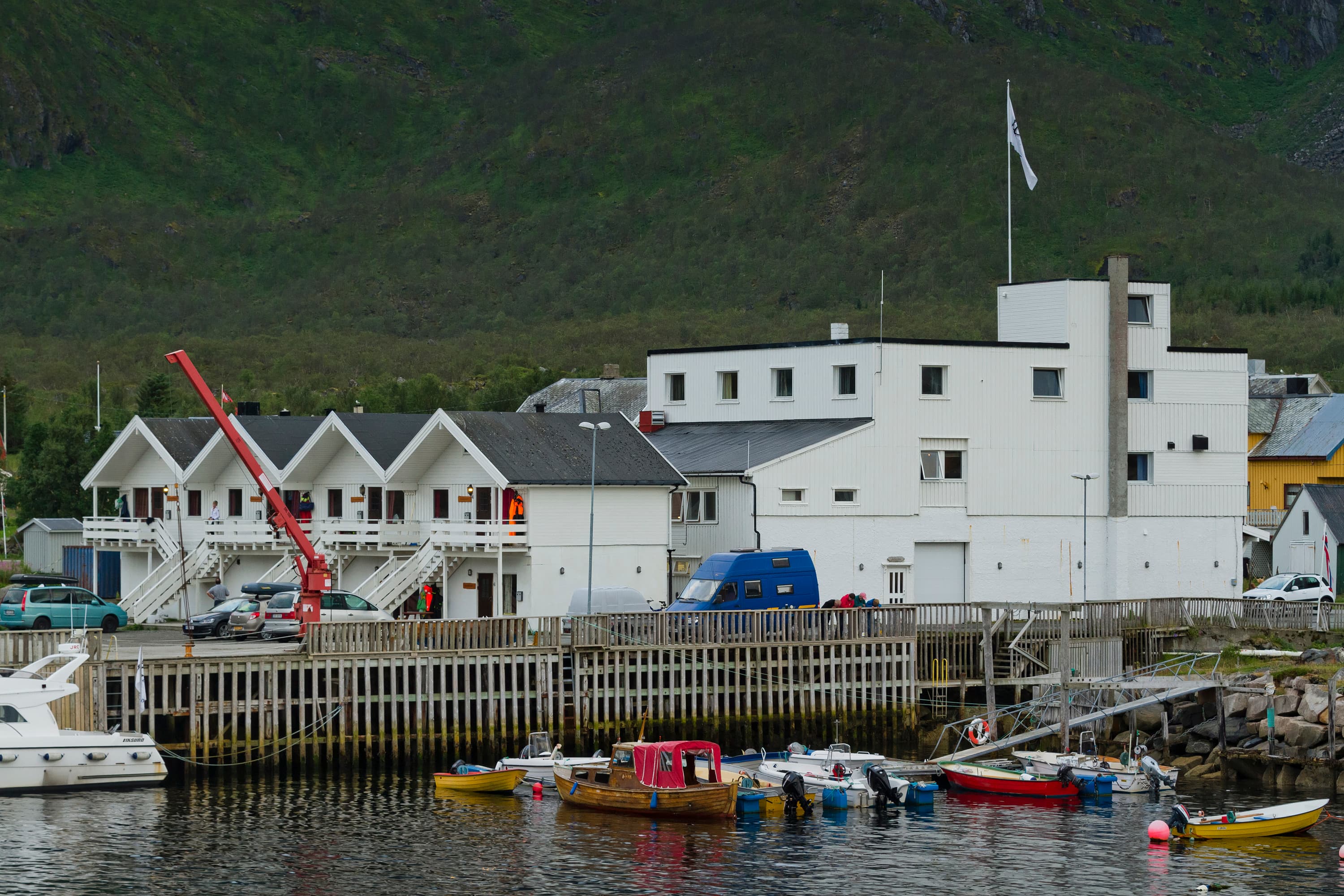 Ximonic (Simo Räsänen) · CC BY-SA 4.0 Mefjord Brygge accommodation, the main hotel building and some coastal cabins in Mefjordvær, Senja, Troms, Norway in 2014 August. Originally the building was serving as a fish factory. Nowadays fishing is one of the freetime activities it offers.